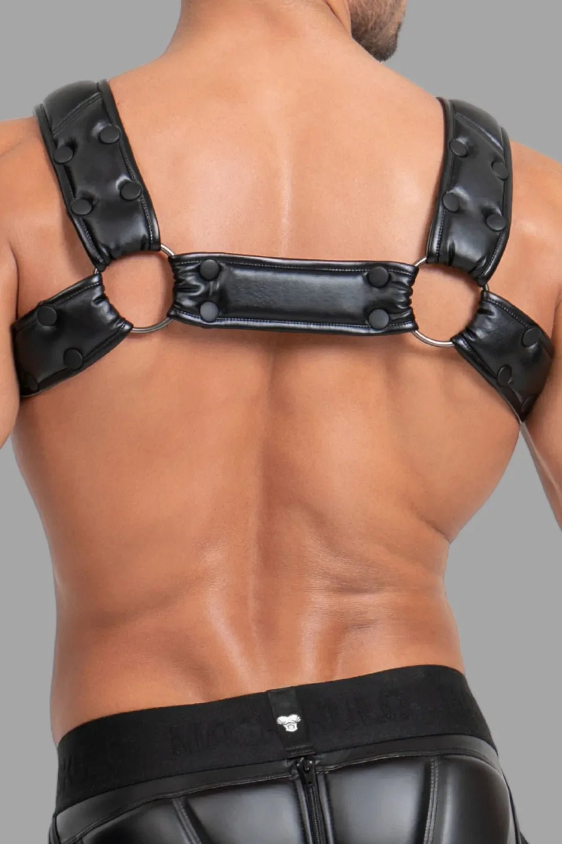 Maskulo Bulldog Harness with 3D Logo in black, an adult male leather-look chest and shoulder harness accessory for style and fitness.